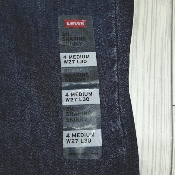 Levi's 311 Mid Rise Shaping Skinny Jean in Medium Wash Blue Size 27 NWT - Picture 9 of 12